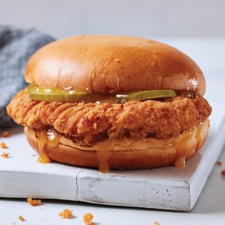 Halal Cajun Chicken Sandwich, regular fries, biscuit, and soda